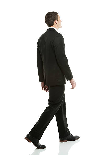 istock Profile of a businessman walking 180826590