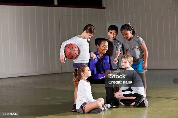 Children With Basketball Coach Stock Photo - Download Image Now - African Ethnicity, African-American Ethnicity, Basketball - Ball