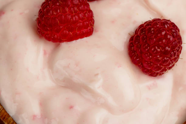 istock fresh yogurt with raspberry flavor, close up 1808268310