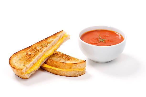 sándwich de queso a la parrilla con pan de masa fermentada - sopa de tomate fotografías e imágenes de stock