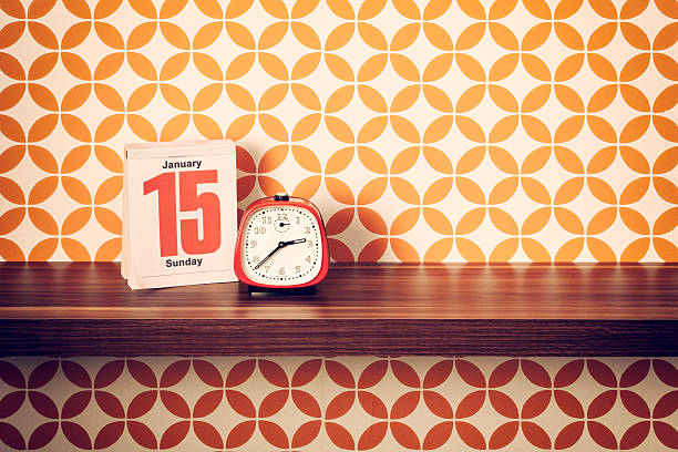 istock Retro style alarm clock and calendar on shelf 180827542