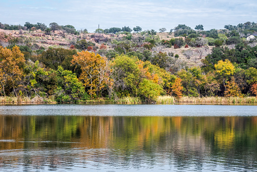 Fall foliage changing season at Inks Lake State Park, Burnet, Texas USA