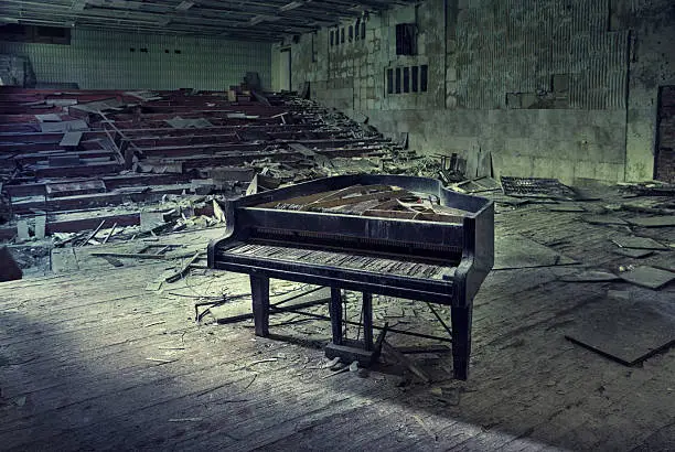 Old Piano in abandoned and demolished building