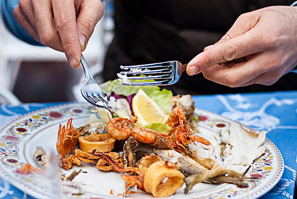 istock Eating in Restaurant, Seafood Dinner 180828125