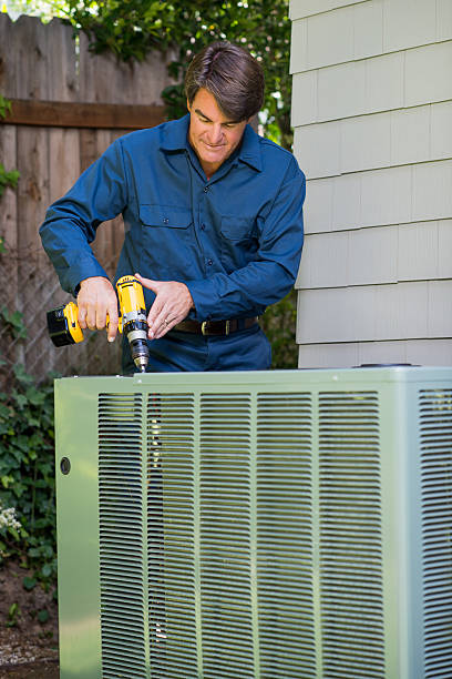 istock Air Conditioner Repairman 180828393
