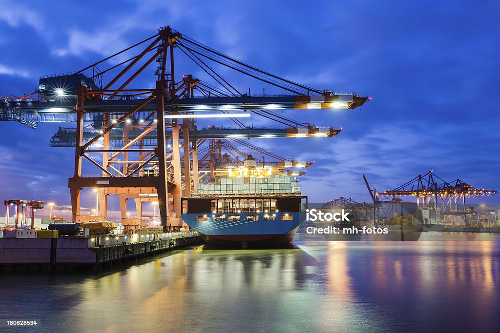 Containerterminal in the harbour I LOVE HAMBURG: Late evening view to the container Terminal Waltershof - Hamburg - Germany - Taken with Canon 5Dmk3 - Canon EF24-70mm f/2.8L IS II USMYou can see more Hamburg aa Harbour-Industry images in my lightbox: Cargo Container Stock Photo