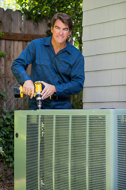 istock Air Conditioner Repairman 180829198
