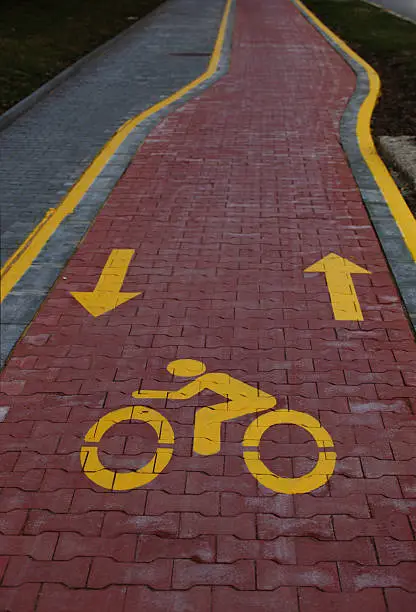 Bicycle way with bicycle sign on it.