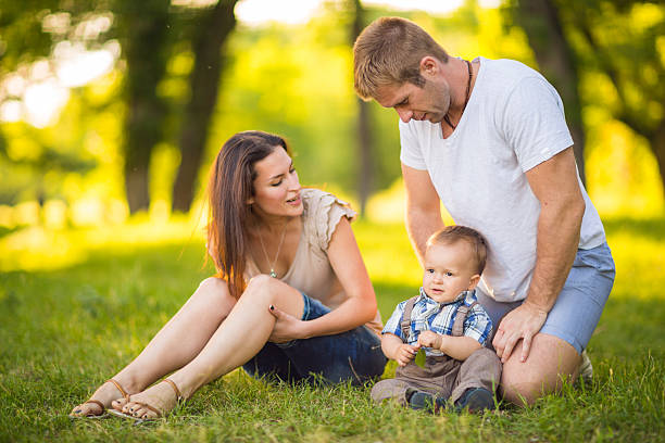 istock Happy family having fun outdoors 180829652