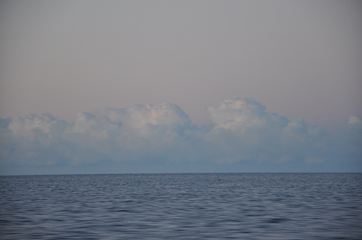 Stormy Adriatic Sea, panoramic view of the Velebit mountain covered with clouds.