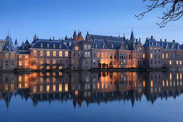 istock illuminated Dutch parliament buildings in The Hague 180830603