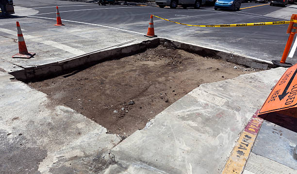 istock Street and Sidewalk Repair 180830998