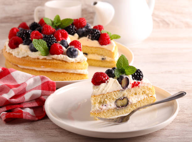 istock Cream and mixed berry sandwich cake 1808318139
