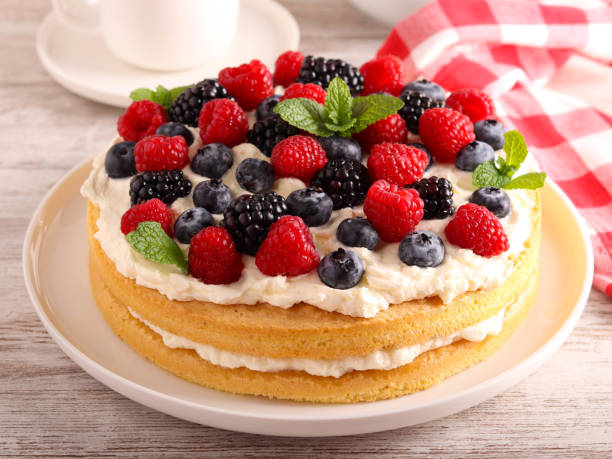 istock Cream and mixed berry sandwich cake 1808318647