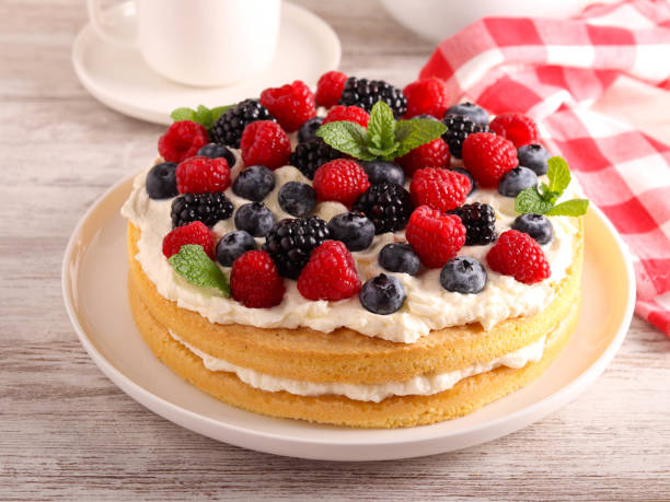 istock Cream and mixed berry sandwich cake 1808321278
