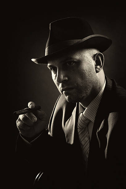 istock Man with bowler hat and cigar 180832354