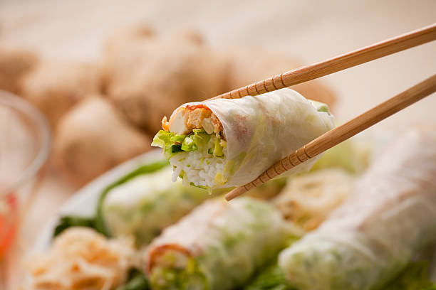 Pulling Spring Roll 210+ Holding Spring Roll Stock Photos, Pictures & Royalty-Free Images ...