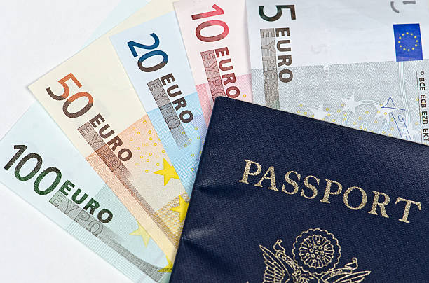 istock American Passport and Euro Banknotes 180832966