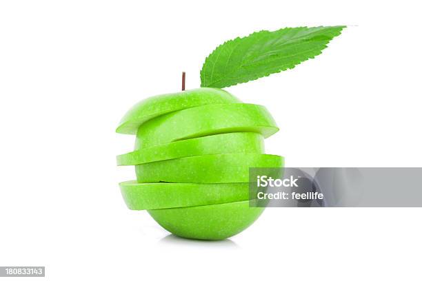 Sliced Green Apple Isolated On White Background Stock Photo - Download Image Now - Apple - Fruit, Balance, Chopped Food