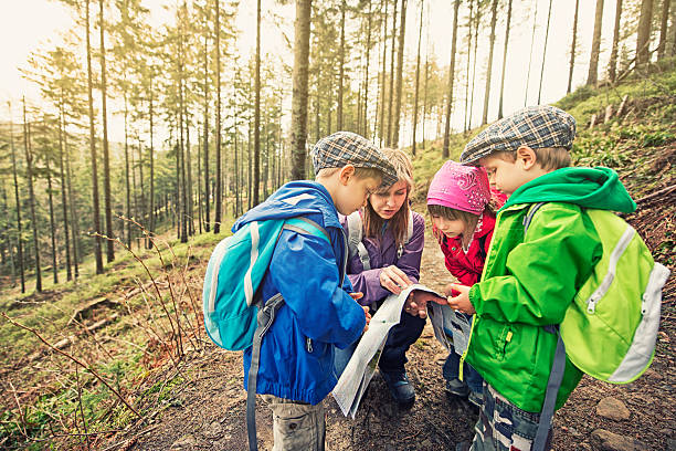 istock Mother and kids hiking 180833220