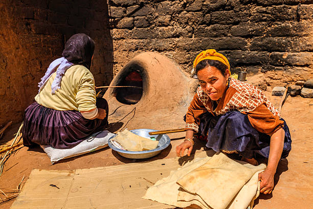 Moroccan women baking bread - khubz