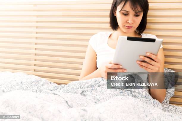 Woman Using Tablet Pc Stock Photo - Download Image Now - Adult, Bed - Furniture, Bedroom