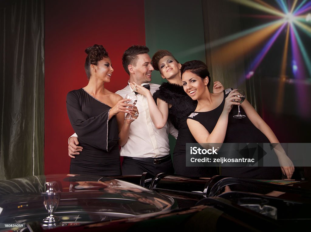 Group of people enjoying in casino Casino Stock Photo