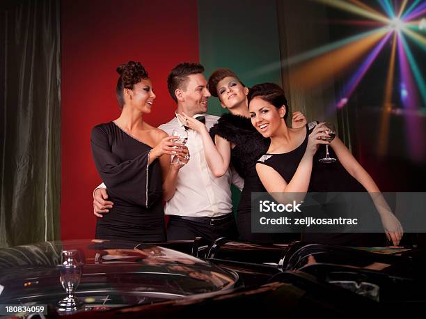 Group Of People Enjoying In Casino Stock Photo - Download Image Now - Casino, Sensuality, Adult