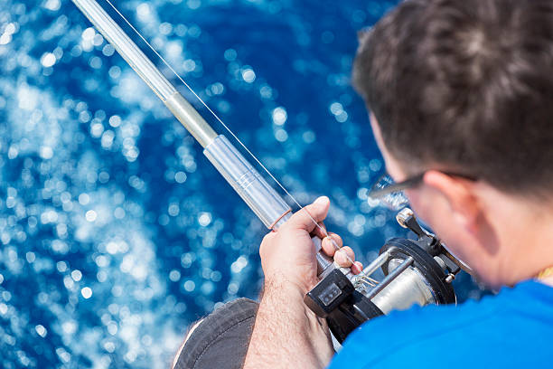 istock Fishing at beautiful blue sea 180834193