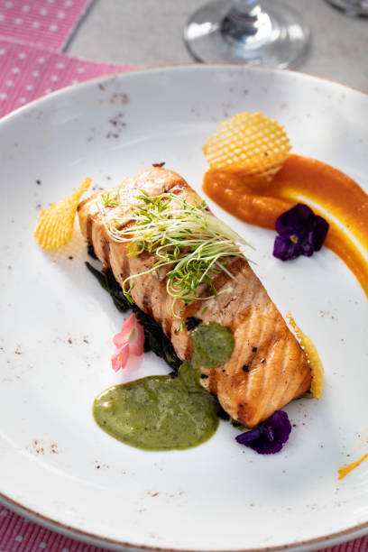 istock grilled salmon with crispy greens in concept 1808343620