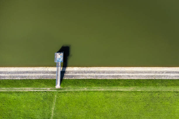 istock Dam and lake overhead view 1808352150