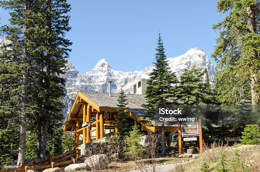 Banff Park Moraine Lake Lodge Moraine Lake in Banff National Park, Alberta. The building is the reception and gift shop for the lodge. Log Cabin Stock Photo