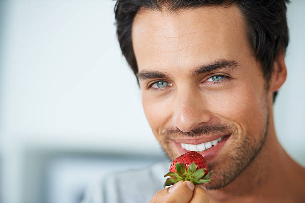 istock Savoring sweet strawberries 180836333