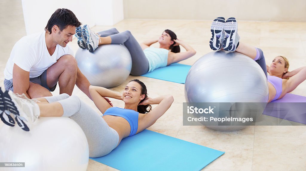 Obtener consejos de expertos gimnasio - Foto de stock de 20 a 29 años libre de derechos