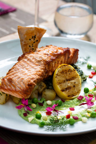 grilled salmon with crispy greens in concept