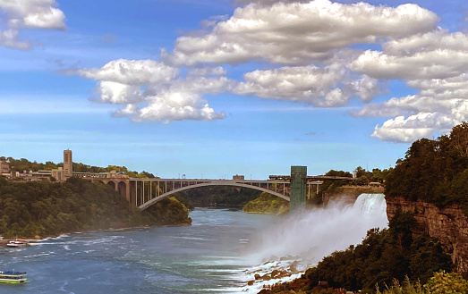 Rainbow Bridge - Full Bridge Length (United States/Canada Crossing) - Niagara Falls, NY on a partial cloudy day