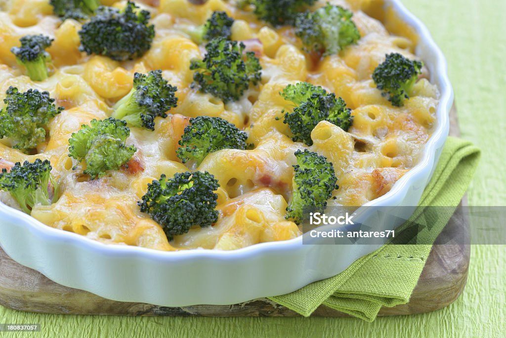 Broccoli and cheese casserole Cheese casserole with broccoli, macaroni and ham Broccoli Stock Photo