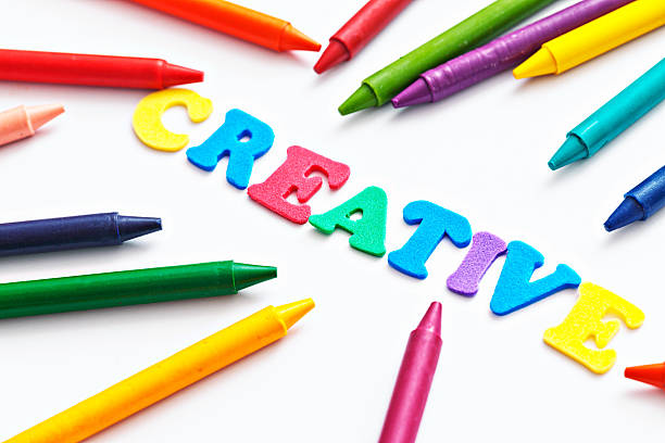 istock CREATIVE say letters surrounded by wax crayons: let's draw! 180837116