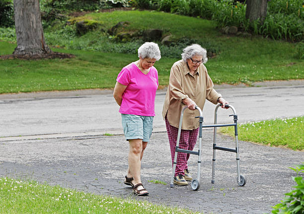istock Senior Adult Women Exercise Walking 180837809