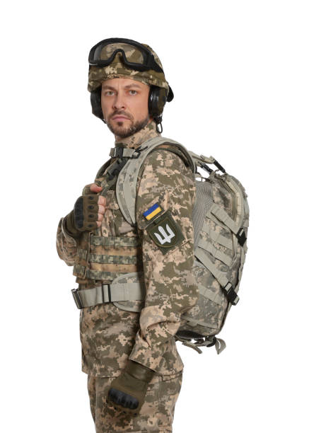 istock Soldier in Ukrainian military uniform with tactical goggles and backpack on white background 1808378689