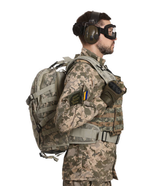 istock Soldier in Ukrainian military uniform and tactical goggles with backpack on white background 1808382012