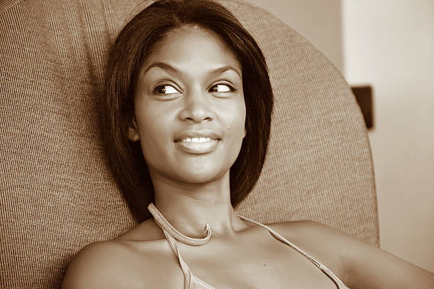 istock Attractive african woman reclining at the spa 180838219