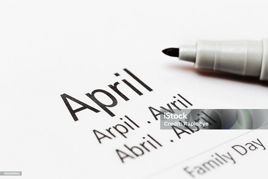 Il calendario mostra il mese di aprile in molte lingue - Foto stock royalty-free di Aprile