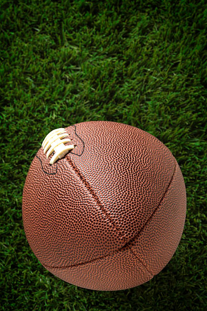 istock American Football on Grass 180838964