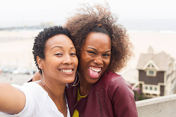 istock Women Being Silly With Self Portraits 180839200