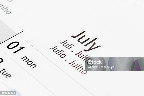 Calendar Shows July Labelled In Many Languages Stock Photo - Download Image Now - Blank, British Culture, Calendar