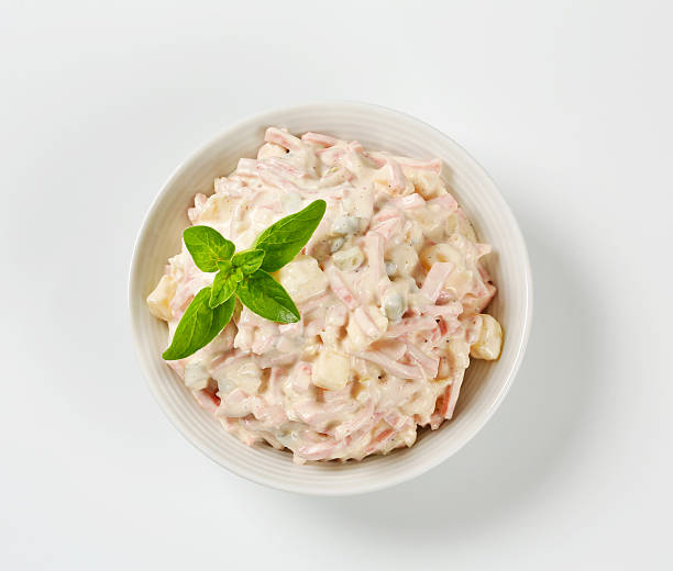 potato ham salad dressed with mayonnaise - skink och potatissallad bildbanksfoton och bilder