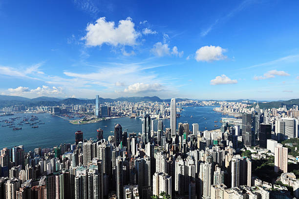 Aerial view of the Victoria harbor in Hong Kong http://i.istockimg.com/file_thumbview_approve/25856700/2/stock-photo-25856700-hong-kong-victoria-harbor.jpg international commerce center stock pictures, royalty-free photos & images