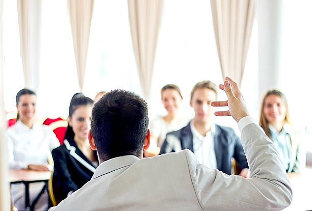 istock Businessman giving presentation to his colleagues. 180839664
