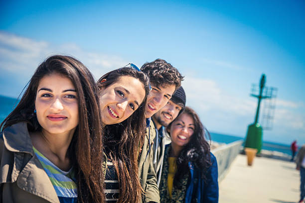 istock Group of happy cheerful friends posing looking at camera 180839888